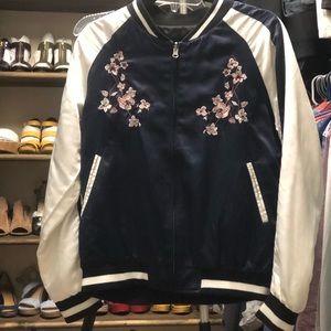 a blue flight jacket